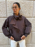 Giacca bomber leggera con fiocco e trapunta interna