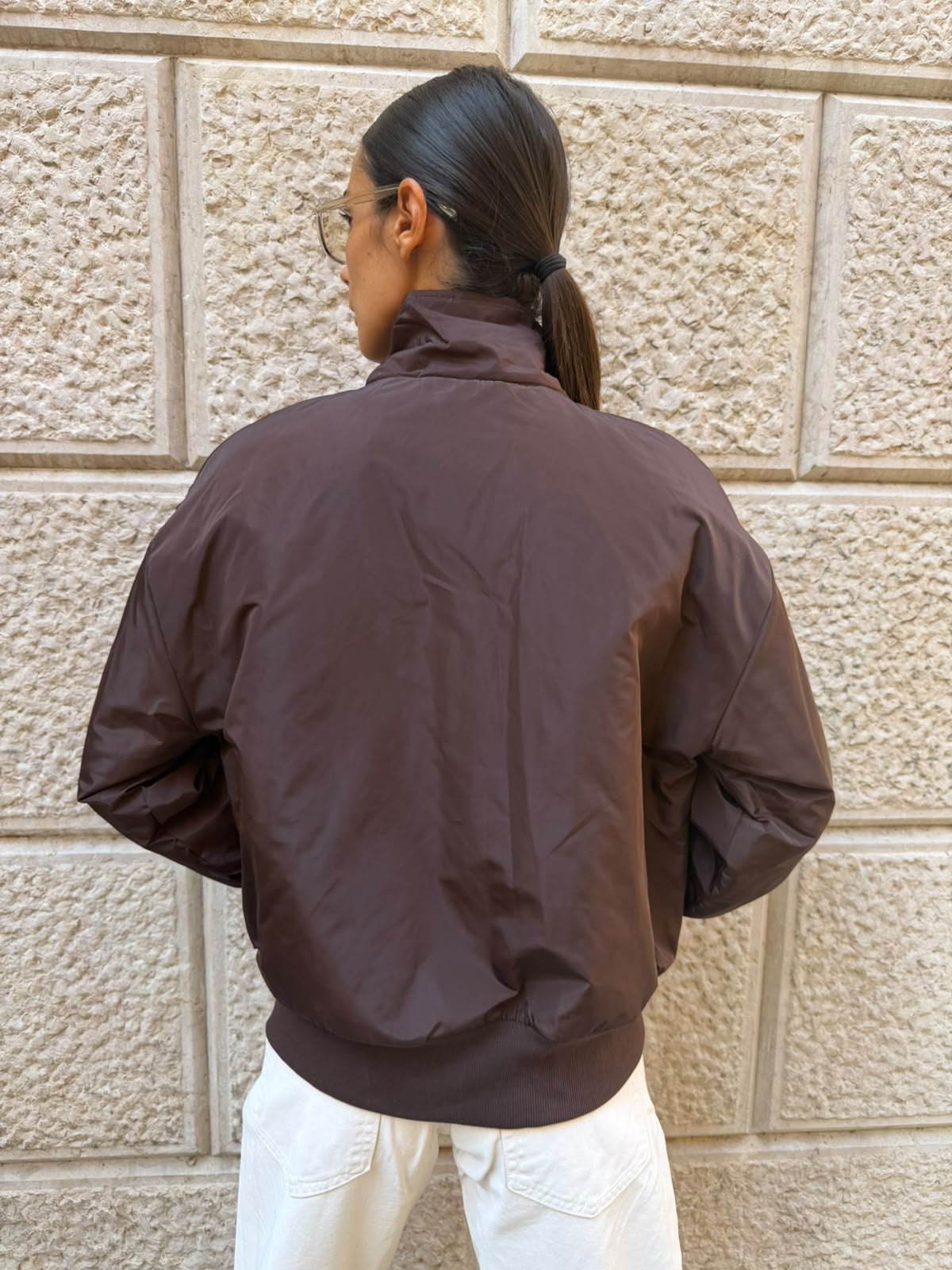 Giacca bomber leggera con fiocco e trapunta interna