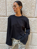 Maglia over con maniche ampie e spalla strutturata